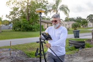 Florida land surveyor taps GPS/Robotic solution to keep crew size down, production up.